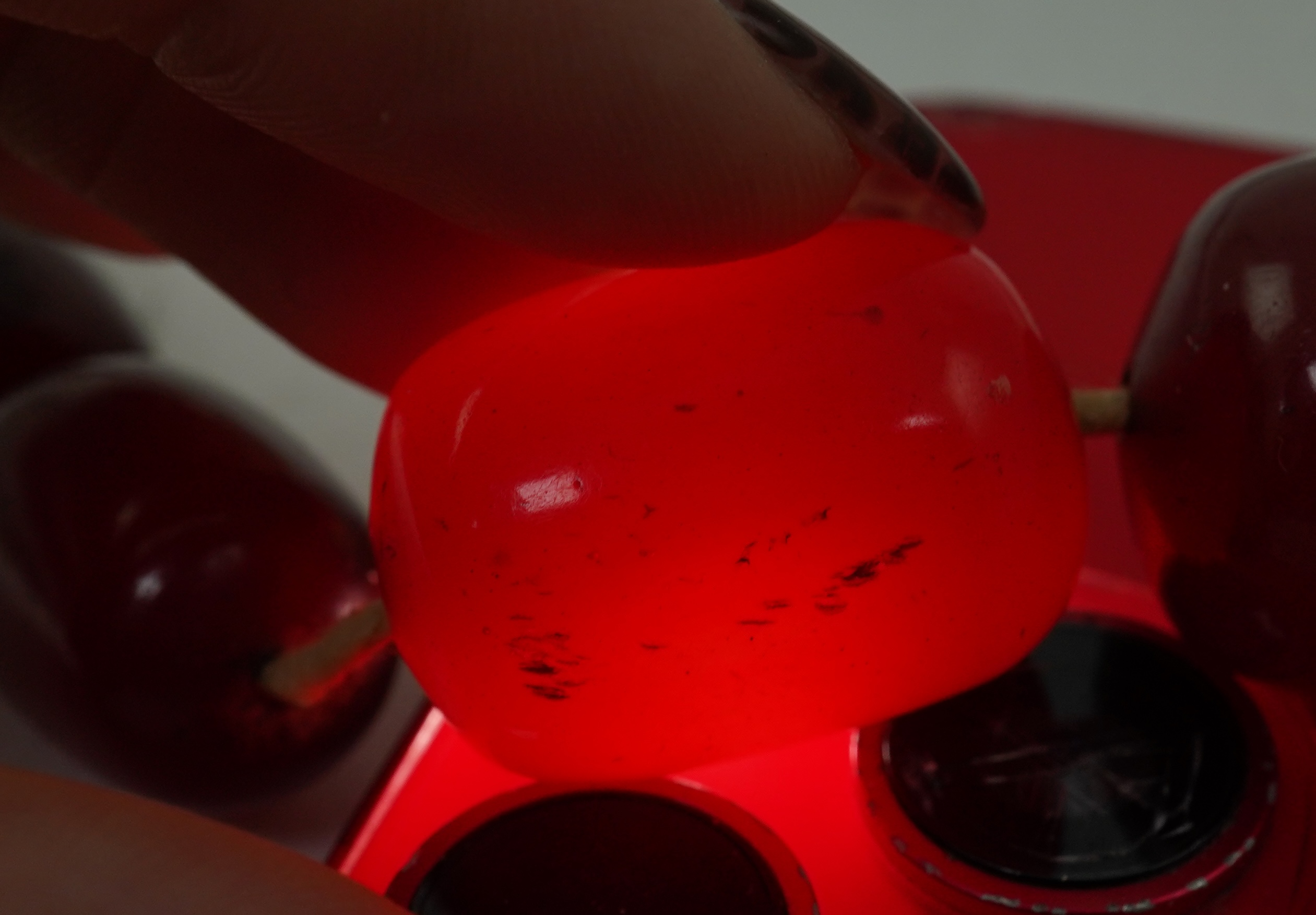 A cherry-coloured bakelite 'amber' necklace